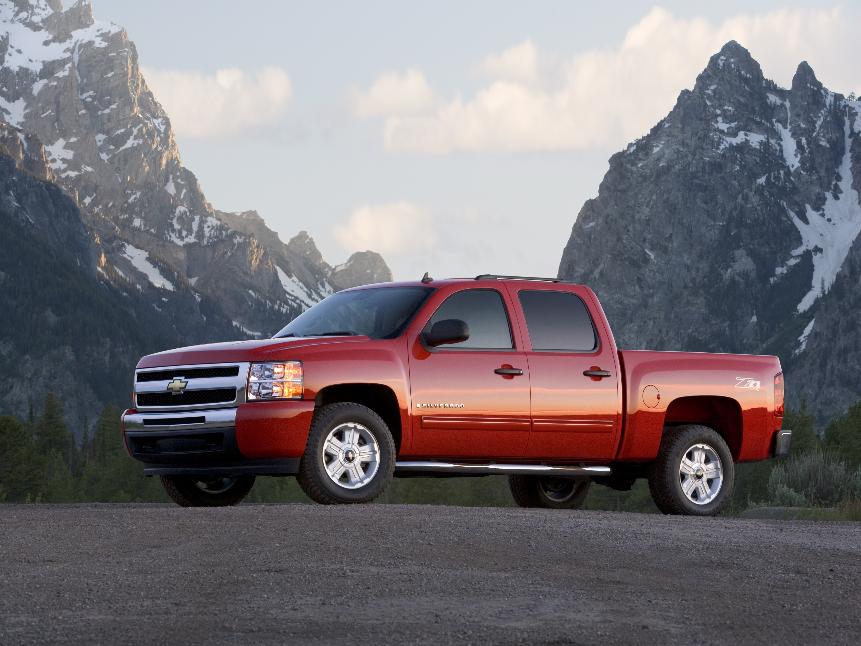 The 2010 Chevy Silverado parked in a field