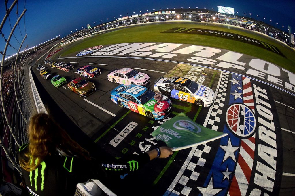 CHARLOTTE, NORTH CAROLINA - MAY 18: Clint Bowyer, driver of the #14 Toco Warranty Ford, leads Kyle Busch, driver of the #18 M&M's Hazelnut Toyota, to start the Monster Energy NASCAR Cup Series All-Star Race at Charlotte Motor Speedway on May 18, 2019 in Charlotte, North Carolina. (Photo by Jared C. Tilton/Getty Images)