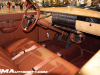 1939-cadillac-60-special-madam-x-chip-foose-collection-2021-sema-live-photos-interior-002-cockpit-steering-wheel-front-bench-seat-clock-on-passenger-side-dash