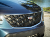 2019-cadillac-xt4-sport-exterior-day-037-grille-with-cadillac-logo-from-side-gma-garage