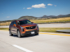 2019-cadillac-xt4-sport-media-drive-mexico-exterior-007-front-three-quarters-on-highway