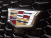 cadillac-logo-on-grille-of-2019-cadillac-xt4-sport-exterior-in-stellar-black-metallic-at-cadillac-event-004