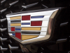 cadillac-logo-on-grille-of-2019-cadillac-xt4-sport-exterior-in-stellar-black-metallic-at-cadillac-event-006