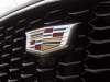 cadillac-logo-on-grille-of-2019-cadillac-xt4-sport-exterior-in-stellar-black-metallic-at-cadillac-event-007