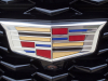 cadillac-logo-on-grille-of-2019-cadillac-xt4-sport-exterior-in-stellar-black-metallic-at-cadillac-event-010