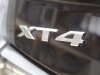 cadillac-xt4-logo-badge-on-2019-cadillac-xt4-sport-exterior-in-stellar-black-metallic-at-cadillac-event-004