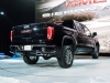 2019-gmc-sierra-at4-1500-exterior-live-at-2018-new-york-auto-show-012-rear-three-quarters-passenger-side-with-gmc-logo