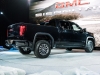 2019-gmc-sierra-at4-1500-exterior-live-at-2018-new-york-auto-show-014-rear-three-quarters-passenger-side