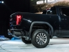 2019-gmc-sierra-at4-1500-exterior-live-at-2018-new-york-auto-show-030-side-profile-bed