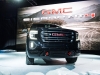 2019-gmc-sierra-at4-1500-exterior-live-at-2018-new-york-auto-show-005-front-end-with-grille-and-gmc-logo