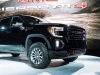 2019-gmc-sierra-at4-1500-exterior-live-at-2018-new-york-auto-show-015-front-end-spotlight-with-gmc-logo