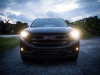 2019-gmc-terrain-exterior-at-dusk-001-front-end-with-headlamps-on