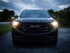 2019-gmc-terrain-exterior-at-dusk-002-front-end-with-headlamps-on