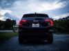 2019-gmc-terrain-exterior-at-dusk-006-rear-end-with-tail-lamps-on