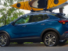 2020-buick-encore-gx-exterior-002-with-kayak-on-roof