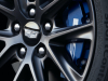 2022-cadillac-ct4-v-first-drive-exterior-029-front-wheel-cadillac-logo-on-wheel-cap-blue-v-brake-caliper