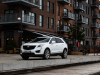 2020-cadillac-xt5-sport-in-denmark-with-russian-license-plates-exterior-006-white-front-three-quarters-goteborg-plats