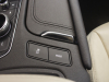 2020-cadillac-xt5-sport-interior-016-drive-mode-button-traction-control-button-sliding-cupholder-cover-panel