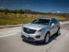 2020-cadillac-xt5-sport-media-drive-mexico-exterior-003-front-three-quarters-on-highway