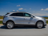 2020-cadillac-xt5-sport-media-drive-mexico-exterior-010-side-profile-on-highway