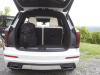 2020-cadillac-xt6-cargo-area-trunk-xt6-drive-003-third-row-upright-and-backpack-in-trunk