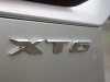 2020-cadillac-xt6-premium-luxury-with-platinum-package-exterior-xt6-drive-030-xt6-badge-logo-on-liftgate