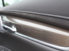 2020-cadillac-xt6-premium-luxury-with-platinum-package-interior-xt6-drive-002-door-stitching-carbon-fiber-trim