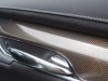 2020-cadillac-xt6-premium-luxury-with-platinum-package-interior-xt6-drive-004-door-stitching-carbon-fiber-trim-door-handle