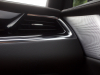 2020-cadillac-xt6-premium-luxury-with-platinum-package-interior-xt6-drive-007-bose-performance-series-speaker-grille-door-trim-ac-vent-passenger-side