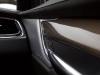2020-cadillac-xt6-premium-luxury-with-platinum-package-interior-xt6-drive-008-bose-performance-series-speaker-grille-door-trim-carbon-fiber-trim-ac-vent-passenger-side