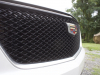 2020-cadillac-xt6-sport-exterior-xt6-drive-winery-018-front-end-grille-cadillac-logo