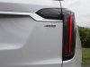 2020-cadillac-xt6-sport-exterior-xt6-drive-winery-033-rear-end-400-badge-logo-tail-light
