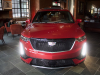 2020-cadillac-xt6-sport-with-platinum-package-red-horizon-tintcoat-xt6-first-drive-lobby-001-front-end