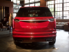 2020-cadillac-xt6-sport-with-platinum-package-red-horizon-tintcoat-xt6-first-drive-lobby-005-rear-end