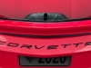 2020-chevrolet-corvette-c8-stingray-coupe-carbon-flash-badges-exterior-outdoor-torch-red-002-rear-trunk-roof-panel-on