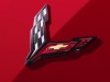 2020-chevrolet-corvette-c8-stingray-coupe-exterior-torch-red-carbon-flash-corvette-logo-badge-002_0