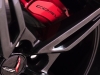 2020-chevrolet-corvette-c8-stingray-coupe-exterior-torch-red-carbon-flash-open-spoke-wheels-corvette-script-on-red-caliper-002