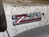 2020-chevrolet-silverado-custom-trail-boss-6-2l-v8-exterior-025-z71-logo-badge