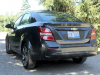 2020-chevrolet-sonic-premier-sedan-rental-exterior-018-rear-three-quarters