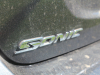 2020-chevrolet-sonic-premier-sedan-rental-exterior-028-sonic-logo-badge