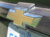 2020-chevrolet-sonic-premier-sedan-rental-exterior-033-chevrolet-logo-badge