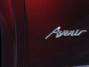 2021-buick-envision-avenir-rich-garnet-metallic-exterior-020-avenir-script-logo-on-front-door