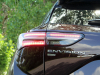 2021-buick-envision-avenir-rich-garnet-metallic-gma-garage-exterior-009-rear-tail-light-detail-envision-nameplate