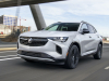 2021-buick-envision-st-sport-touring-package-summit-white-real-world-exterior-002-front-three-quarters
