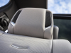2021-cadillac-escalade-interior-first-row-seats-with-speakers-in-headrest