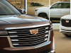 2021-cadillac-escalade-sport-and-premium-luxury-exterior-004-with-cadillac-logos-on-grilles