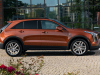 2021-cadillac-xt4-sport-europe-exterior-021-side-profile