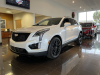 2021-cadillac-xt5-sport-400-with-20-inch-s2k-wheels-in-gloss-black-exterior-004-front-three-quarters