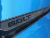 2022-chevrolet-bolt-euv-first-drive-exterior-bright-blue-metallic-025-bolt-euv-logo-on-headlight-assembly