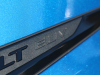 2022-chevrolet-bolt-euv-first-drive-exterior-bright-blue-metallic-026-euv-logo-on-headlight-assembly